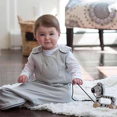 Toddler wearing a Nested Bean Sleep Sack